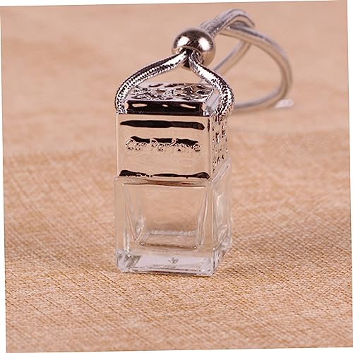 VICASKY 10 Pcs Glass Perfume Bottle Pendant with Hollow Design