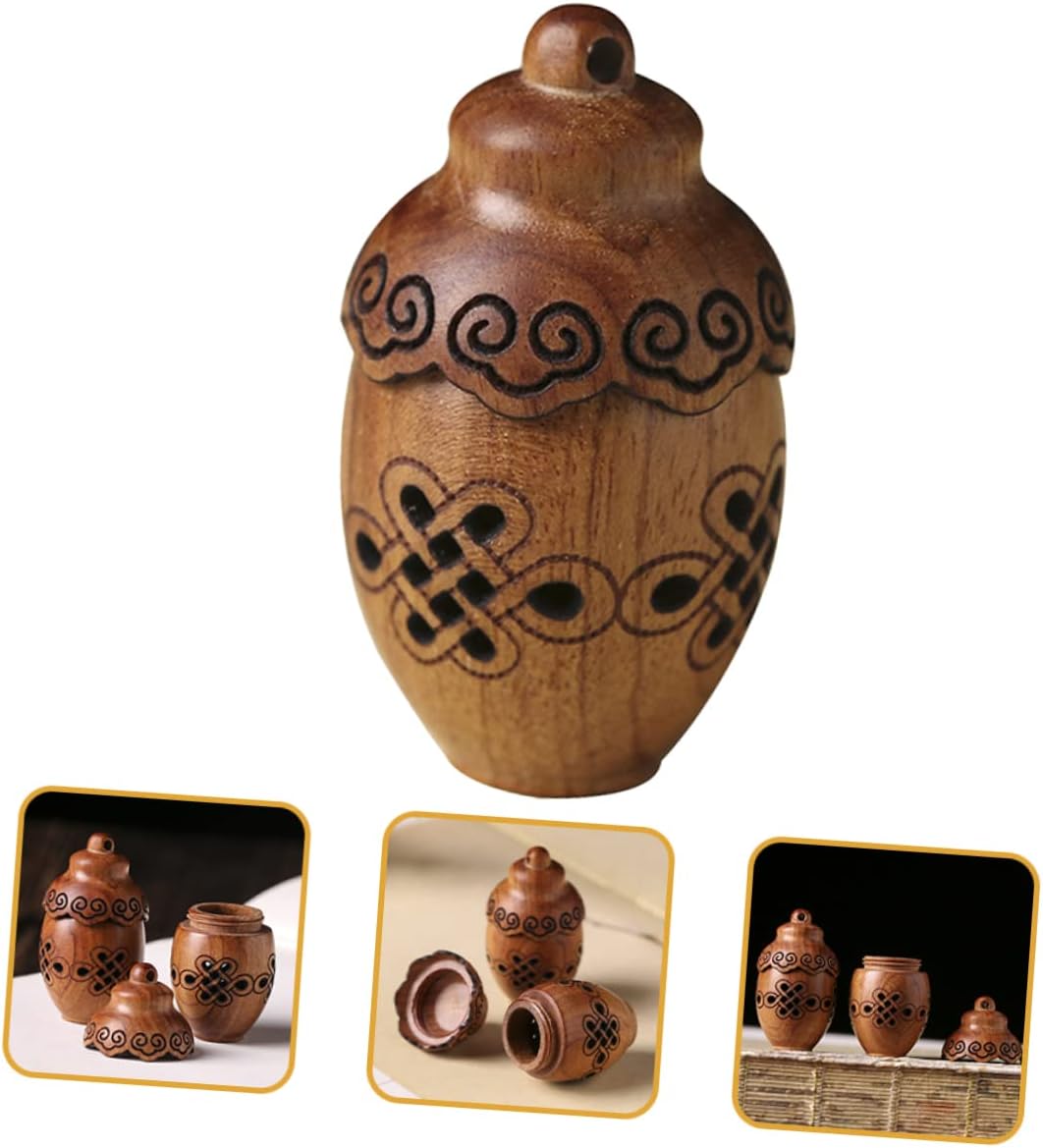 Hollow Aromatherapy Bottle Pendant with Rotating Design