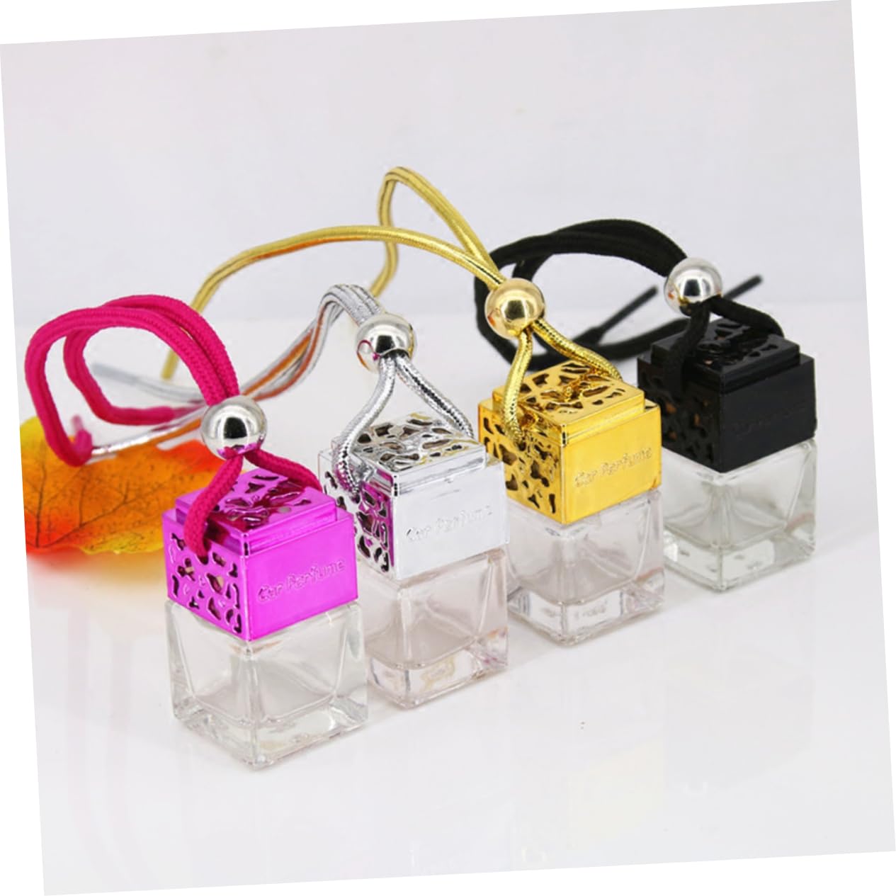 4pcs Hollow Glass Perfume Bottles with Elegant Designs